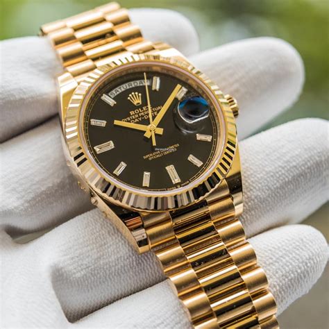 rolex day date gold mit schwarz römisch